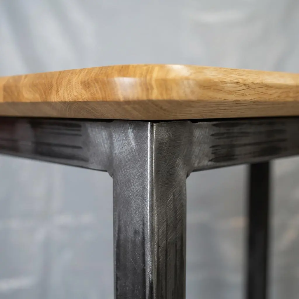 kappa-table-raw-steel-welded-frame-closeup-1789236686472.webp