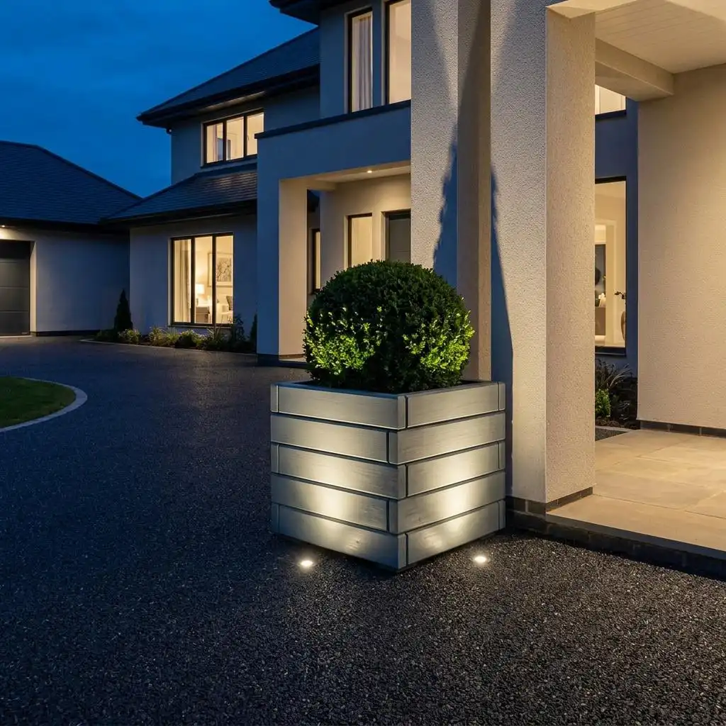 kingsbury-pewter-grey-square-planter-topiary-night-uplighting-driveway-1789491868580.webp
